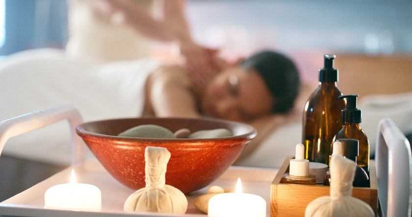 Spa, relax  and product for massage, customer and candles for aroma therapy, holiday and masseuse. Hotel, fragrance and vacation for person in resort, break and treatment for back, zen and service