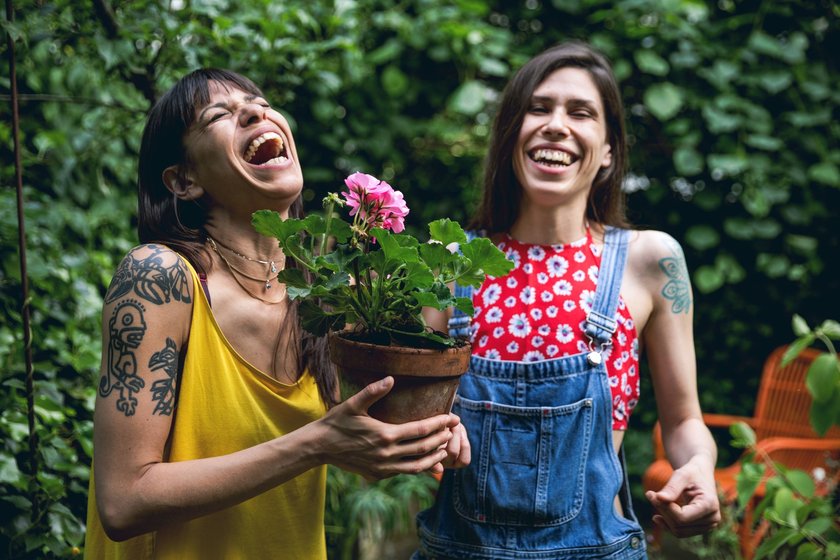 Sister gardening plants in the back yard of the home